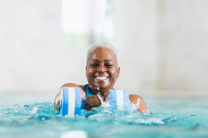 woman doing water aerobics