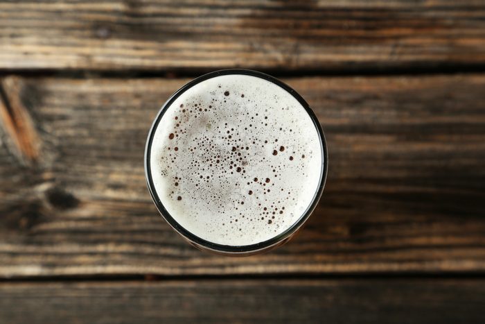 looking down into glass of beer