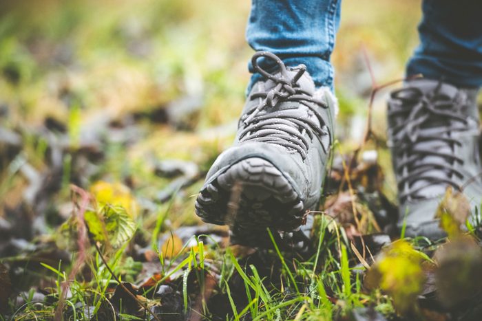 close up of hiking boots on a trail
