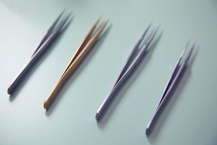 four pairs of tweezers