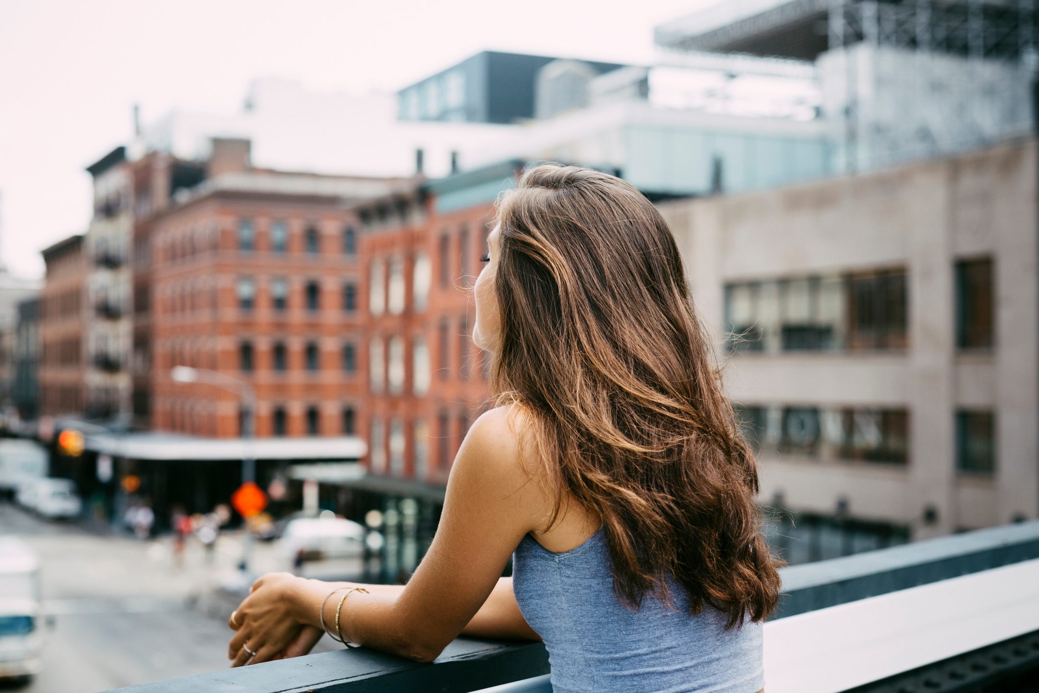 rear view of young woman with long, brown hair