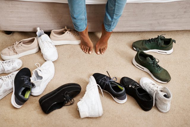 sneakers surrounding feet