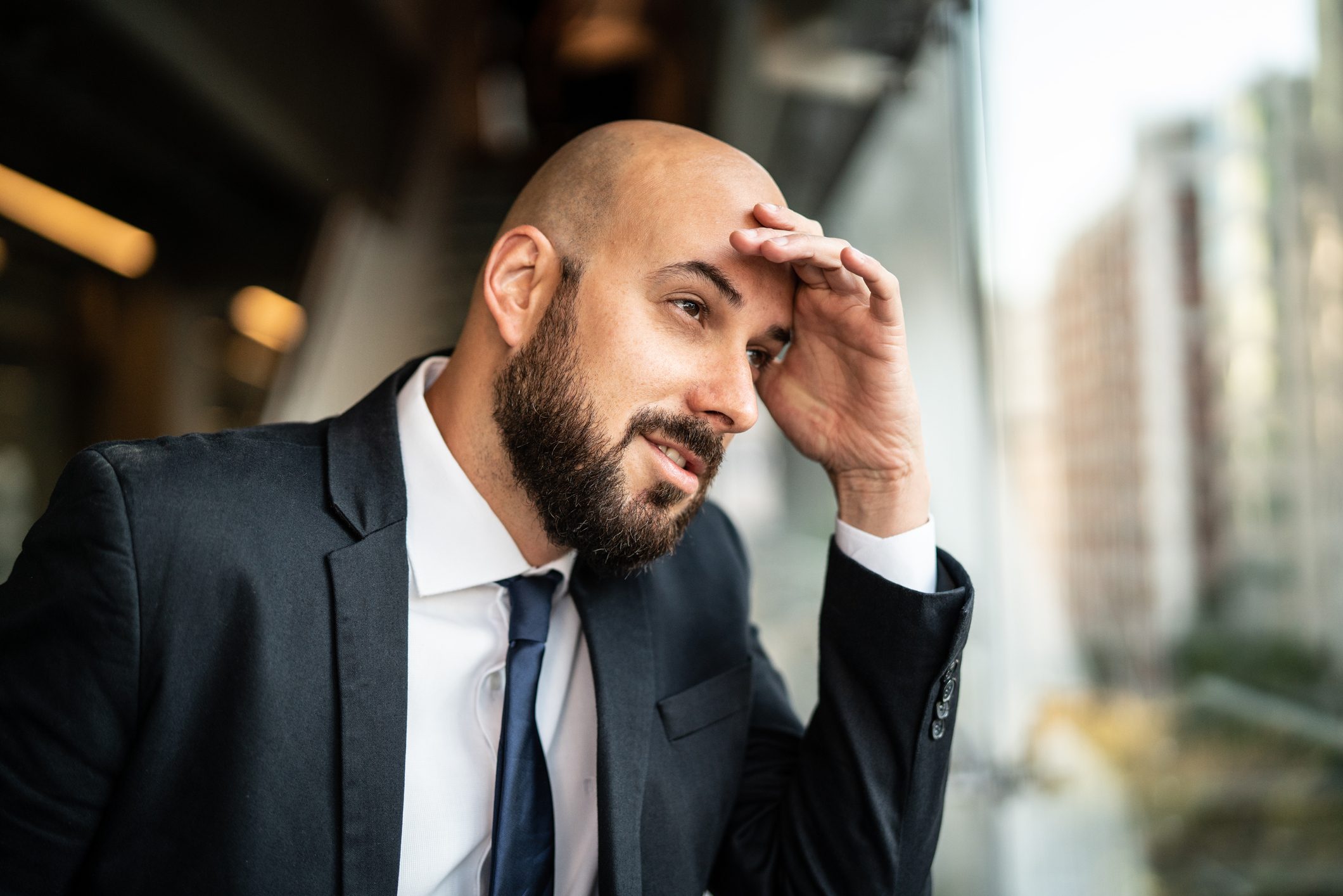 man thinking about what to do