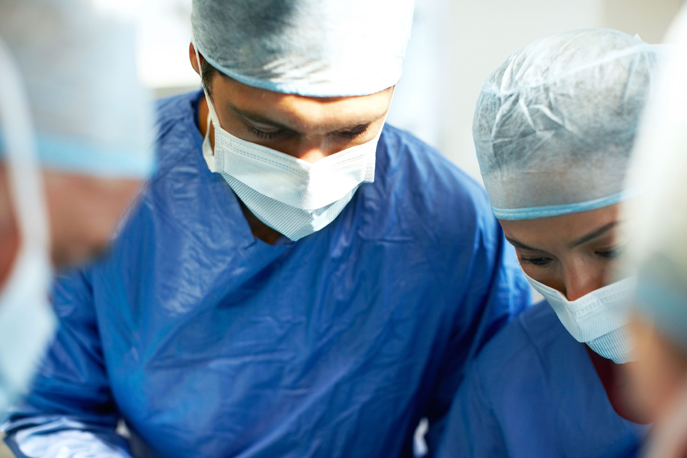 Surgeons performing surgery