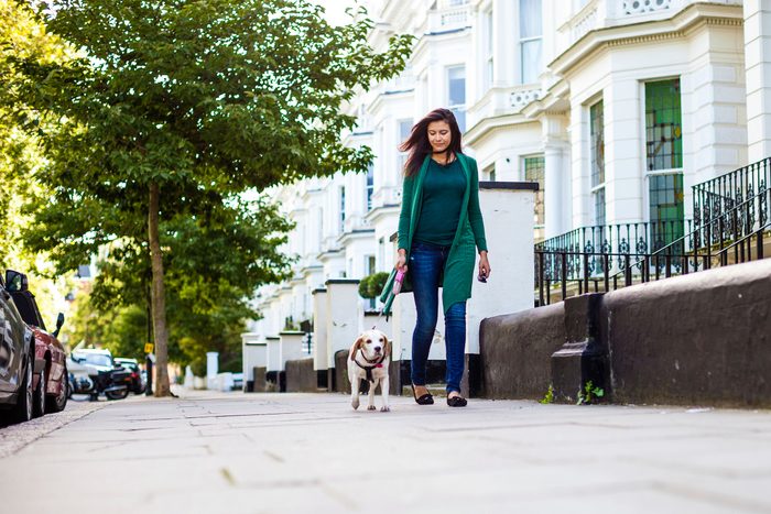 woman walking dog