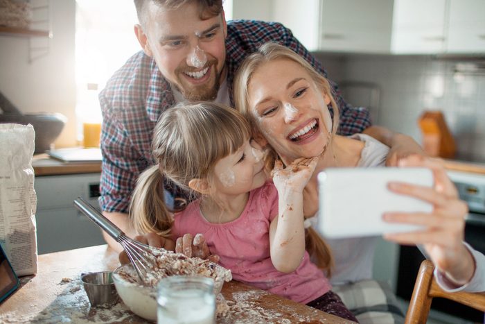 messy family taking selfie