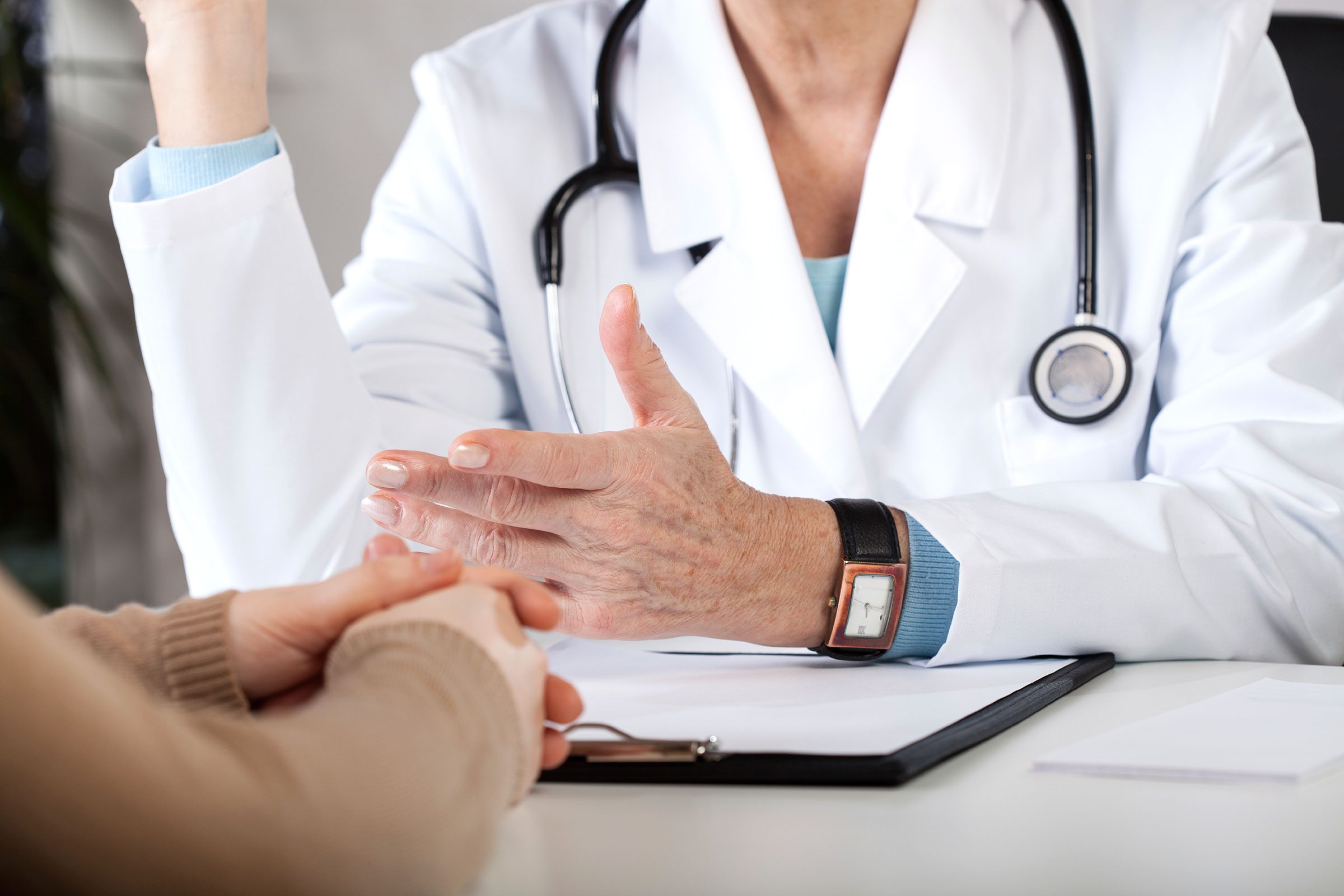 doctor talking with patient