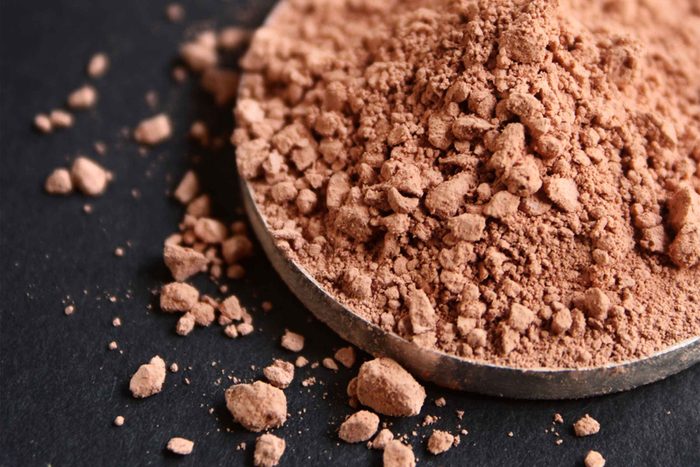 Tin of bronzer makeup powder.