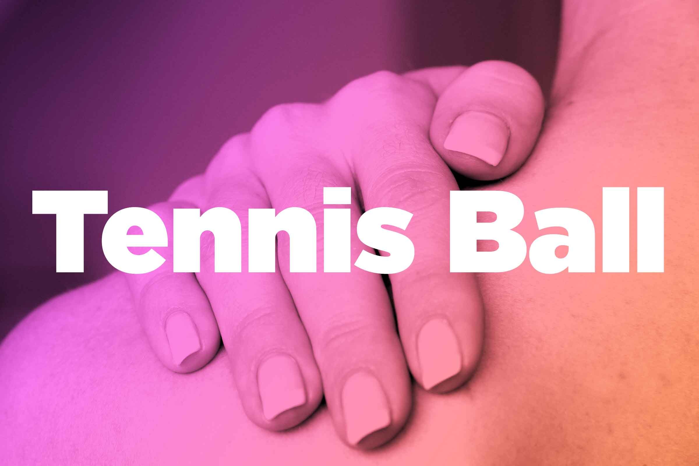 Words "tennis ball" over image of hands rubbing shoulder