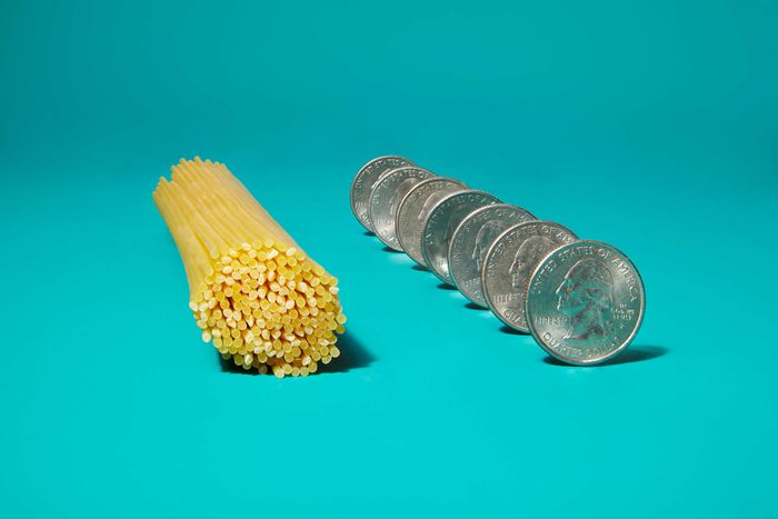 Illustration of portion control trick: spaghetti and quarters