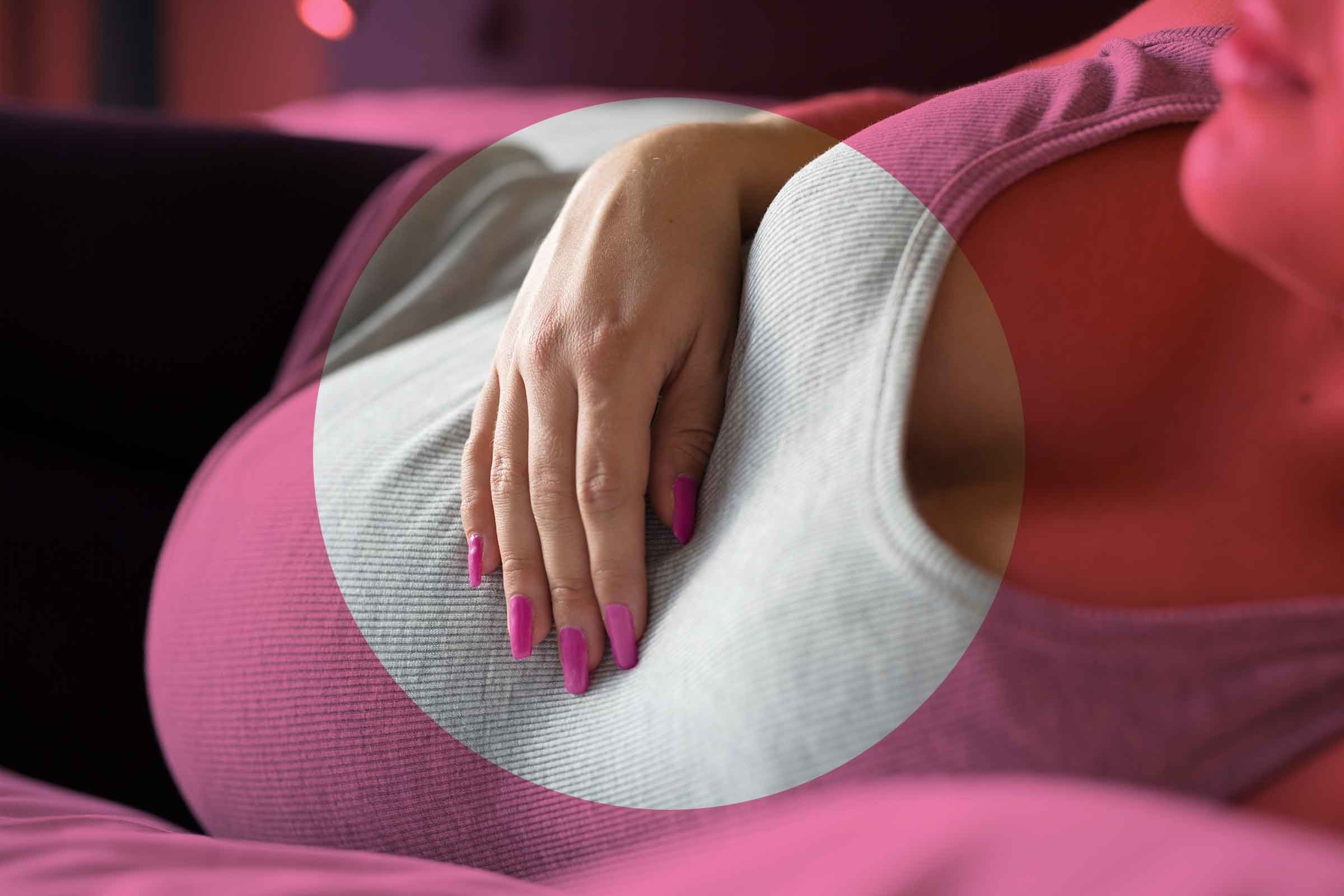 pregnant woman lying on her side