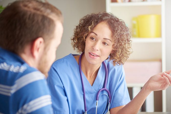 doctor talking with patient