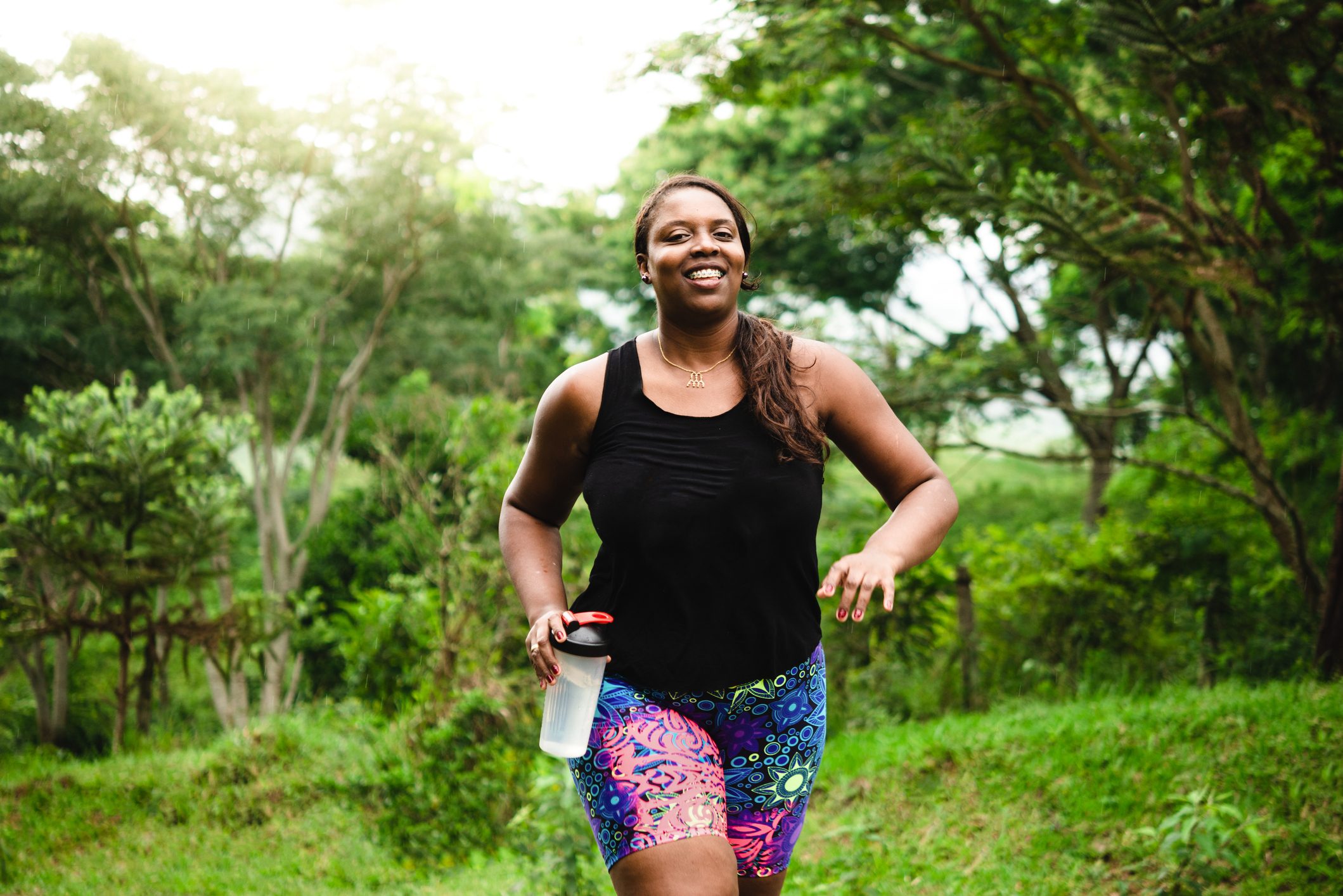 woman walking and exercising in nature