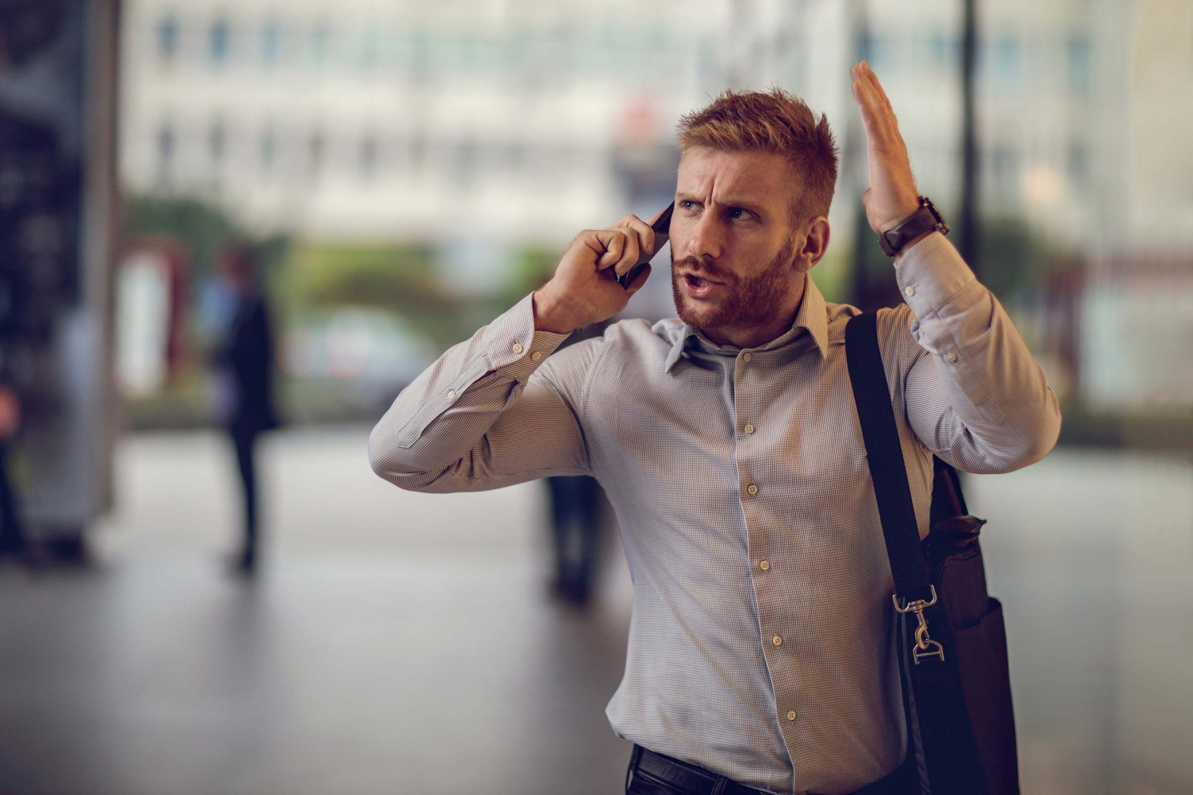 angry man talking on the phone