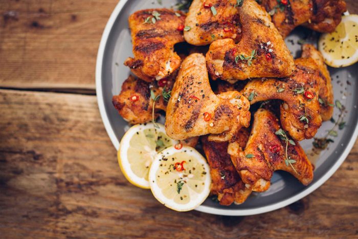 chicken wings piled high on a platter