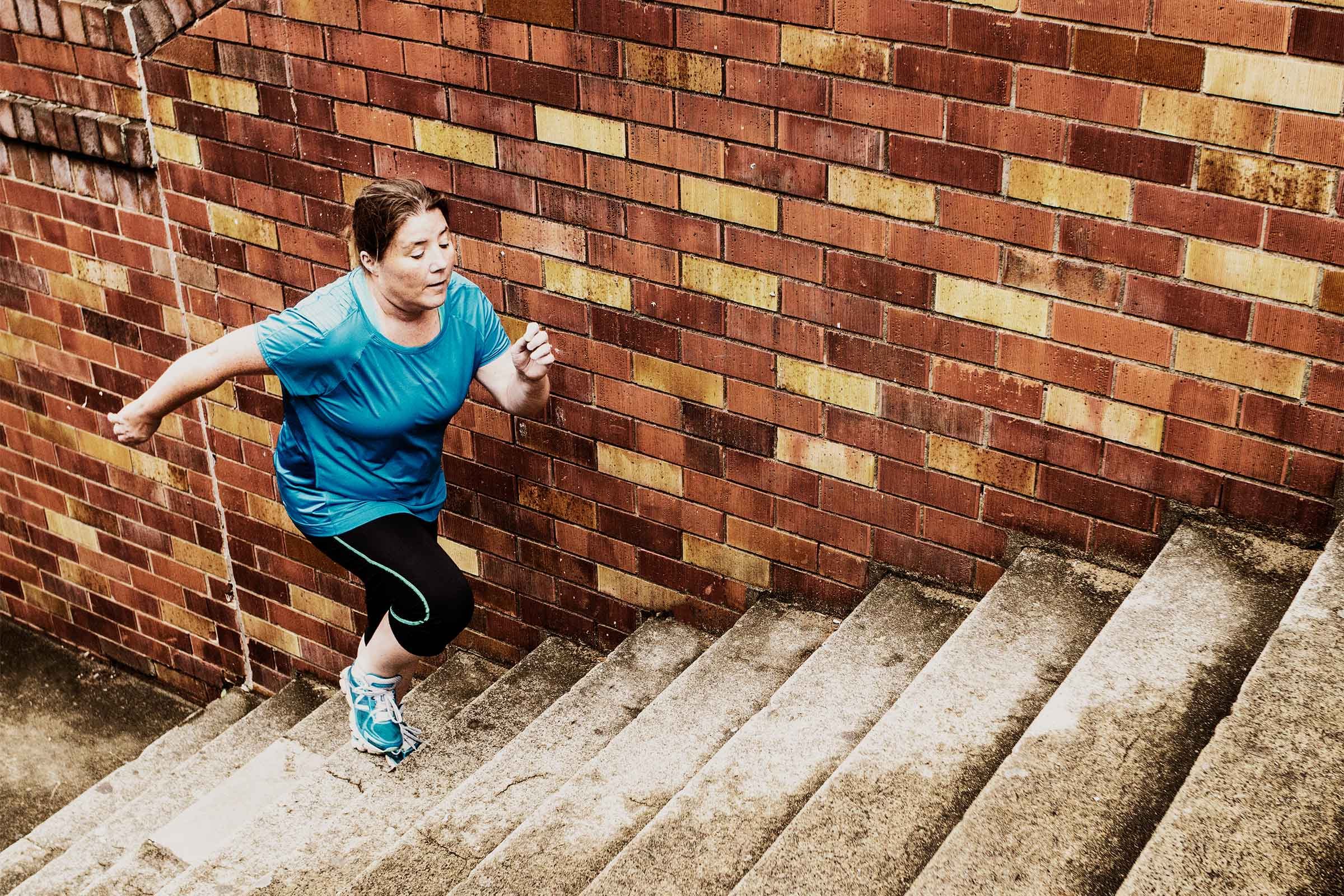 woman running stairs