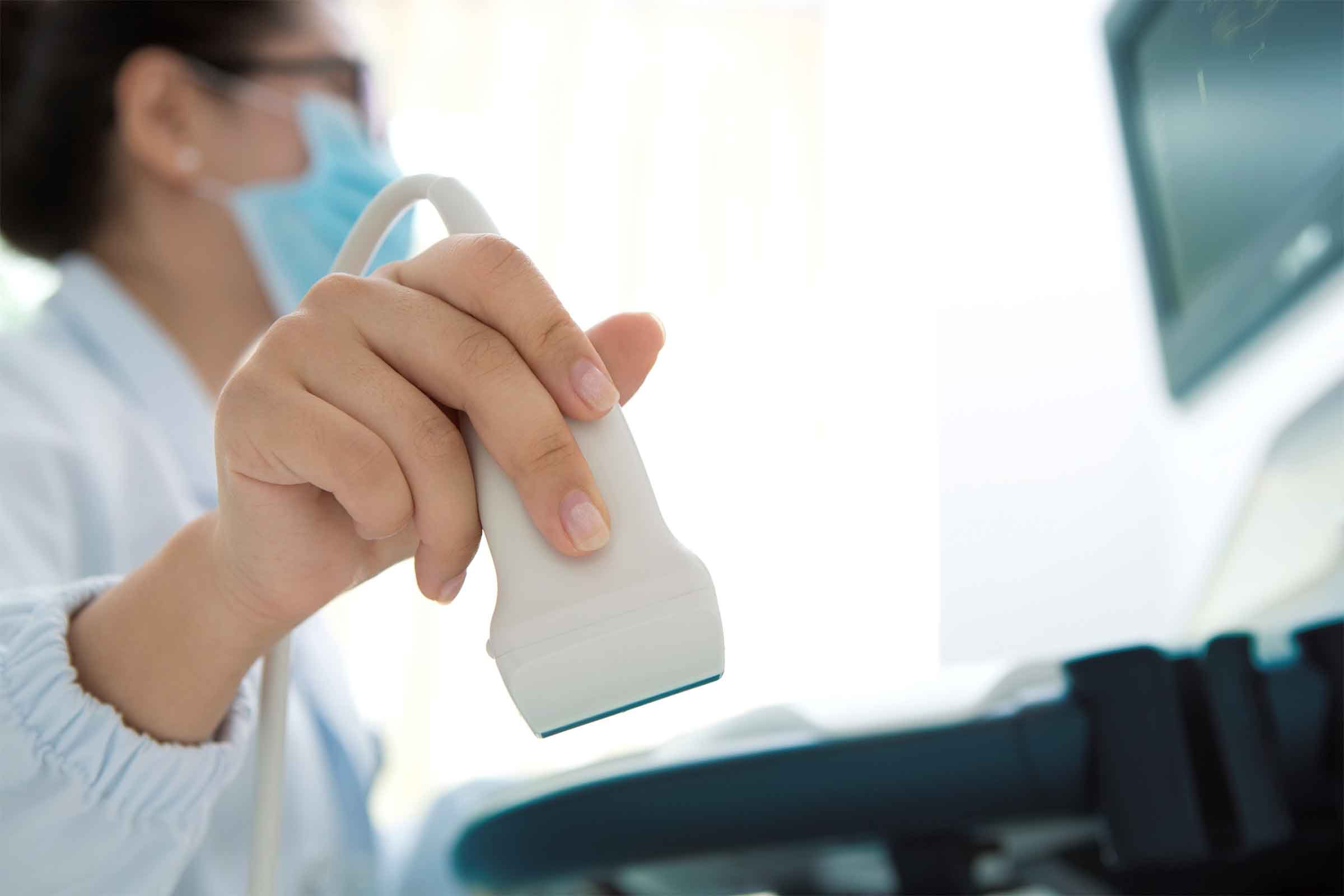 doctor performing an ultrasound