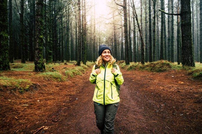 happy woman on a nature hike