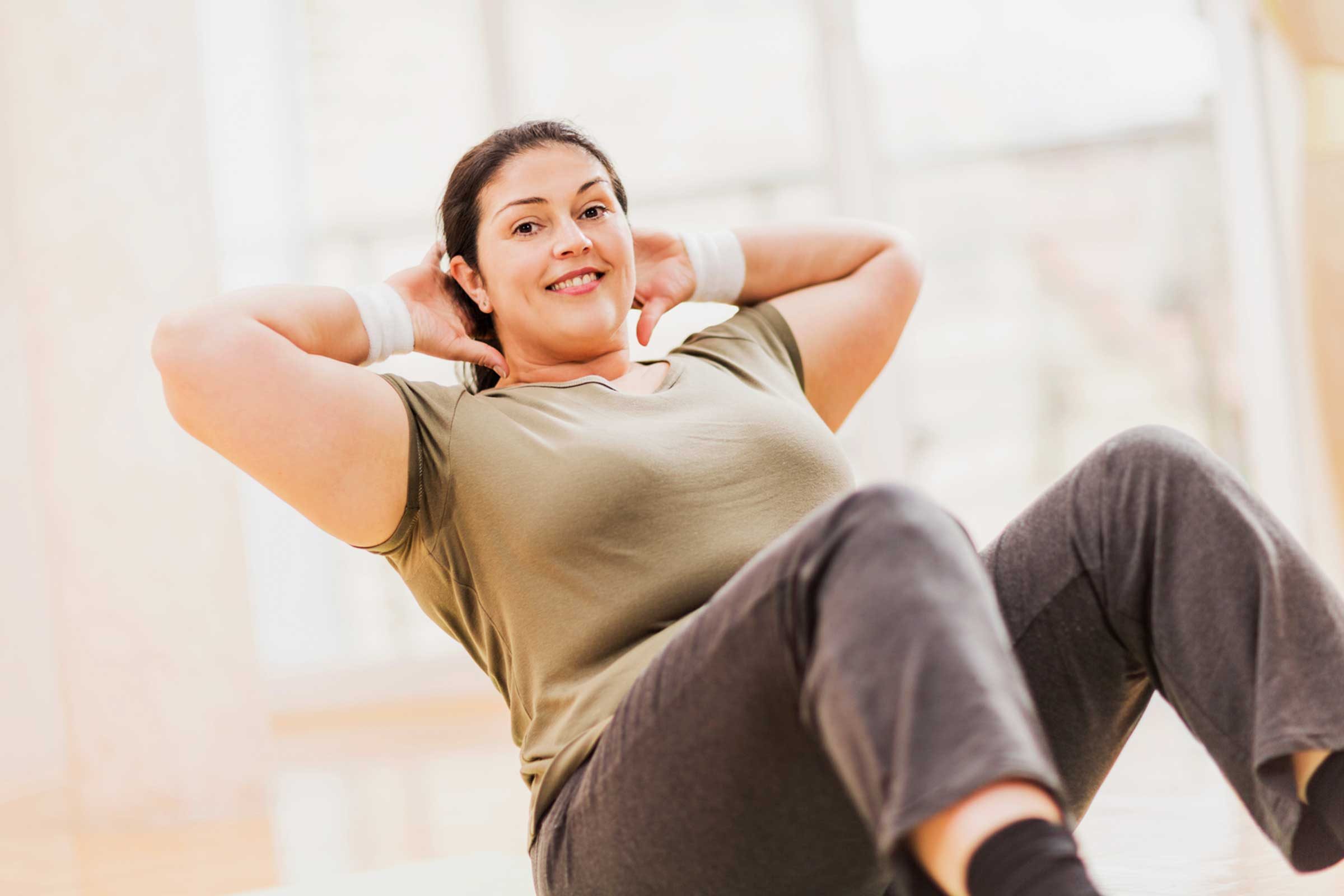 heavy woman doing situps