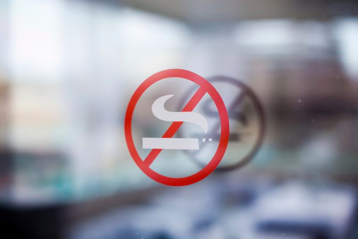 no smoking sign on window