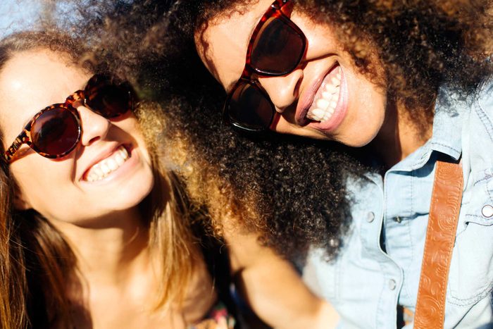 two women wearing sunglasses