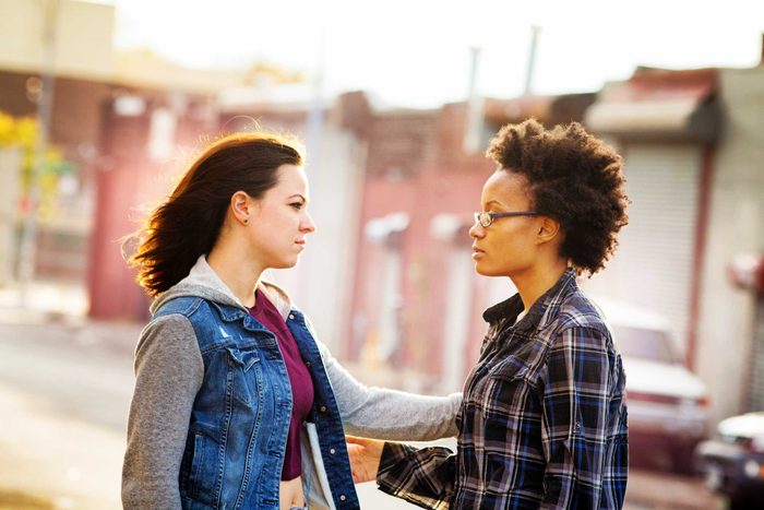 two women talking to each other