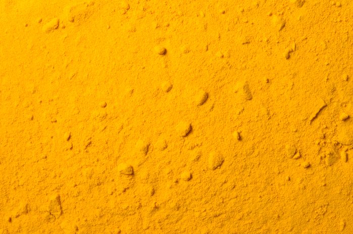 Close up photo of ground turmeric