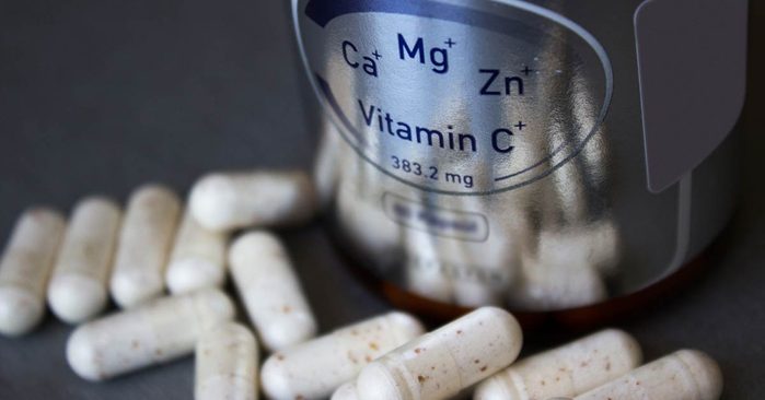 vitamin capsules on table