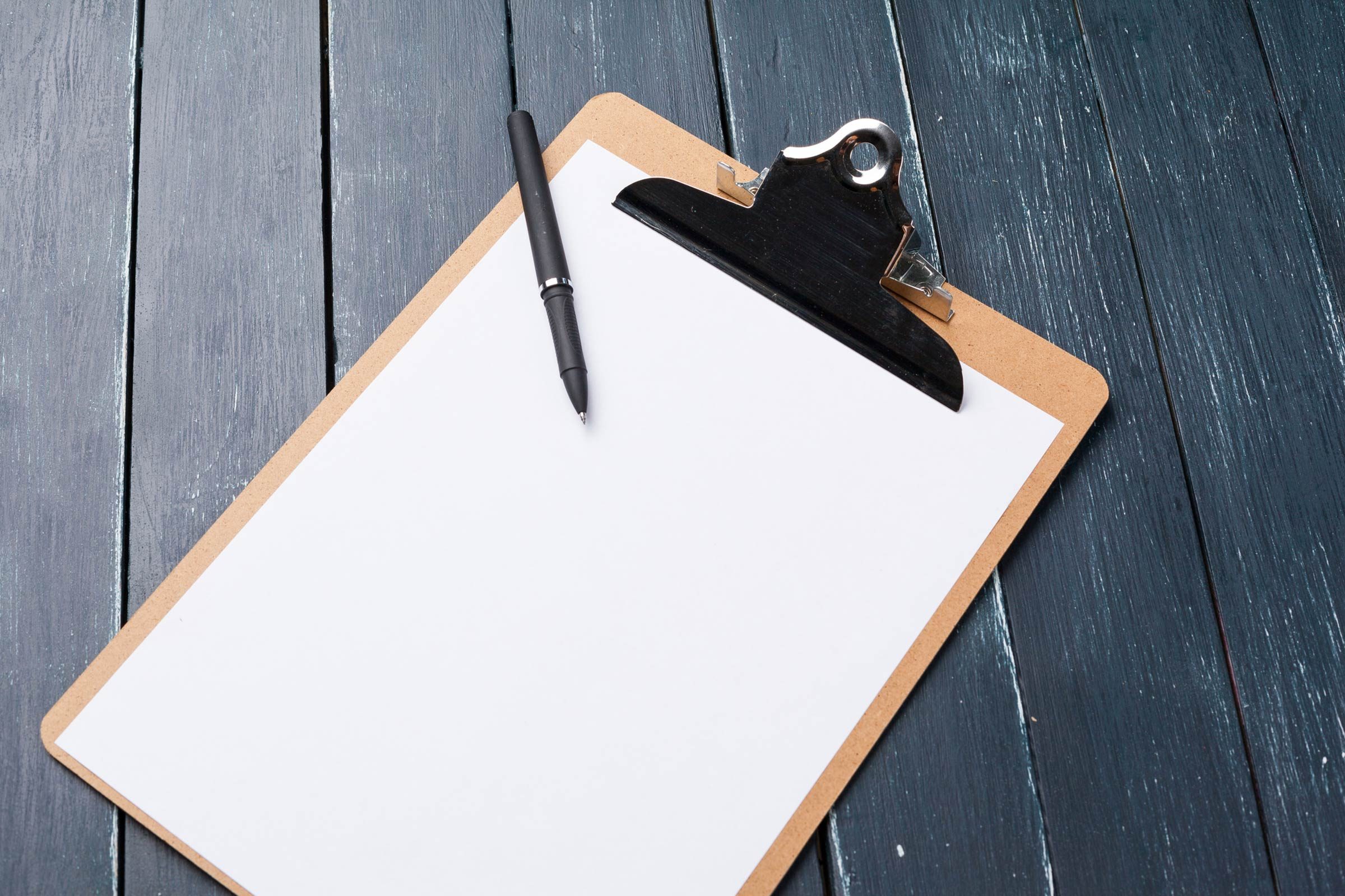 Blank piece of paper on a clipboard.