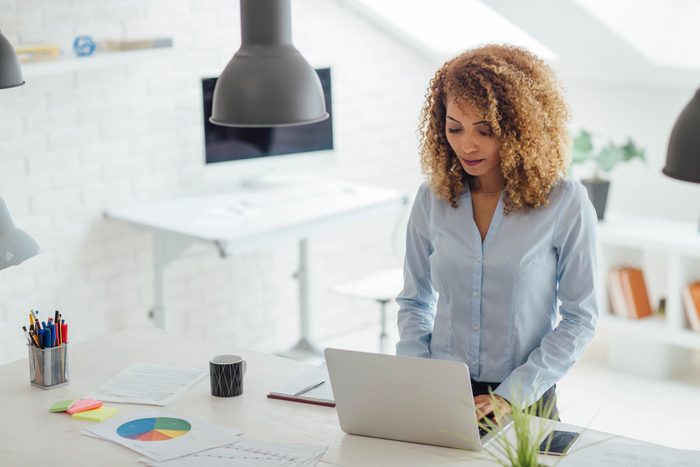 woman working on a laptop computer