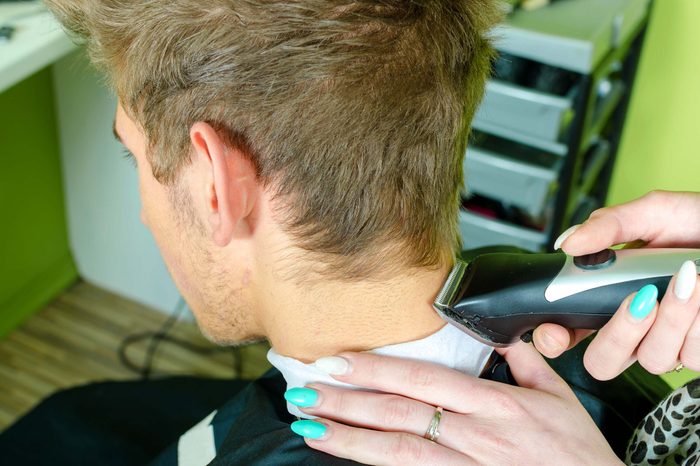 man getting a razor cut