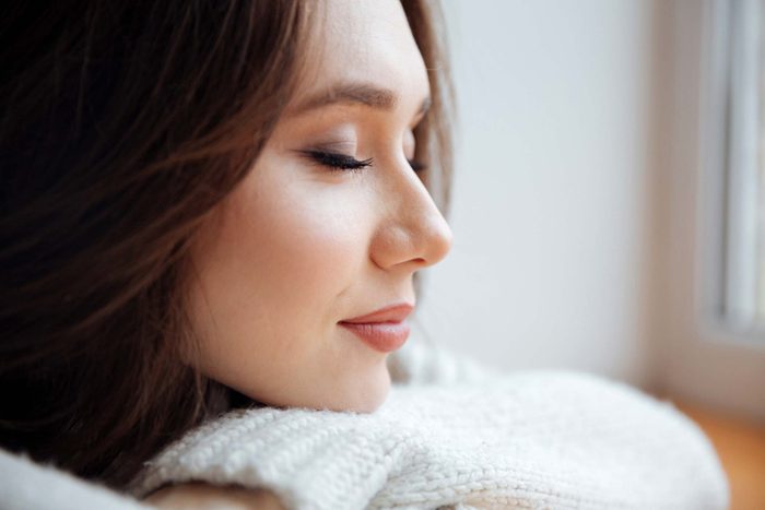 woman with eyes cloed