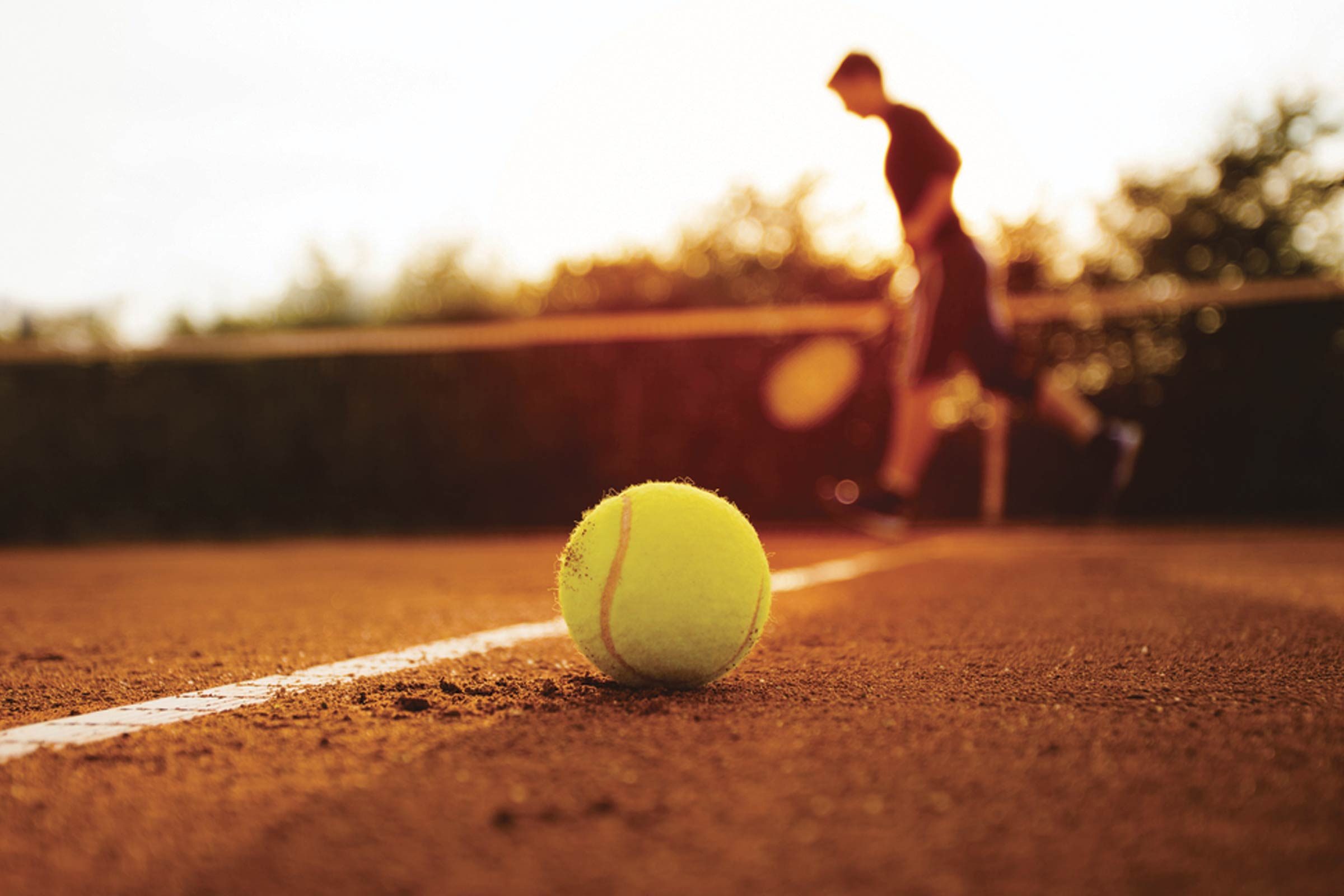 close up of tennis ball on court