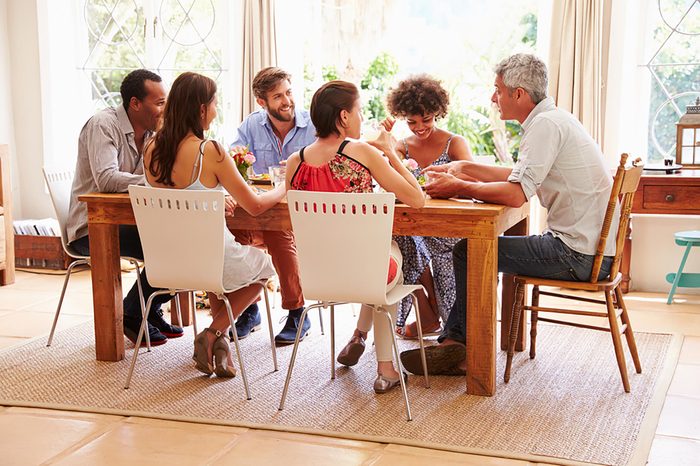 Friends eating dinner