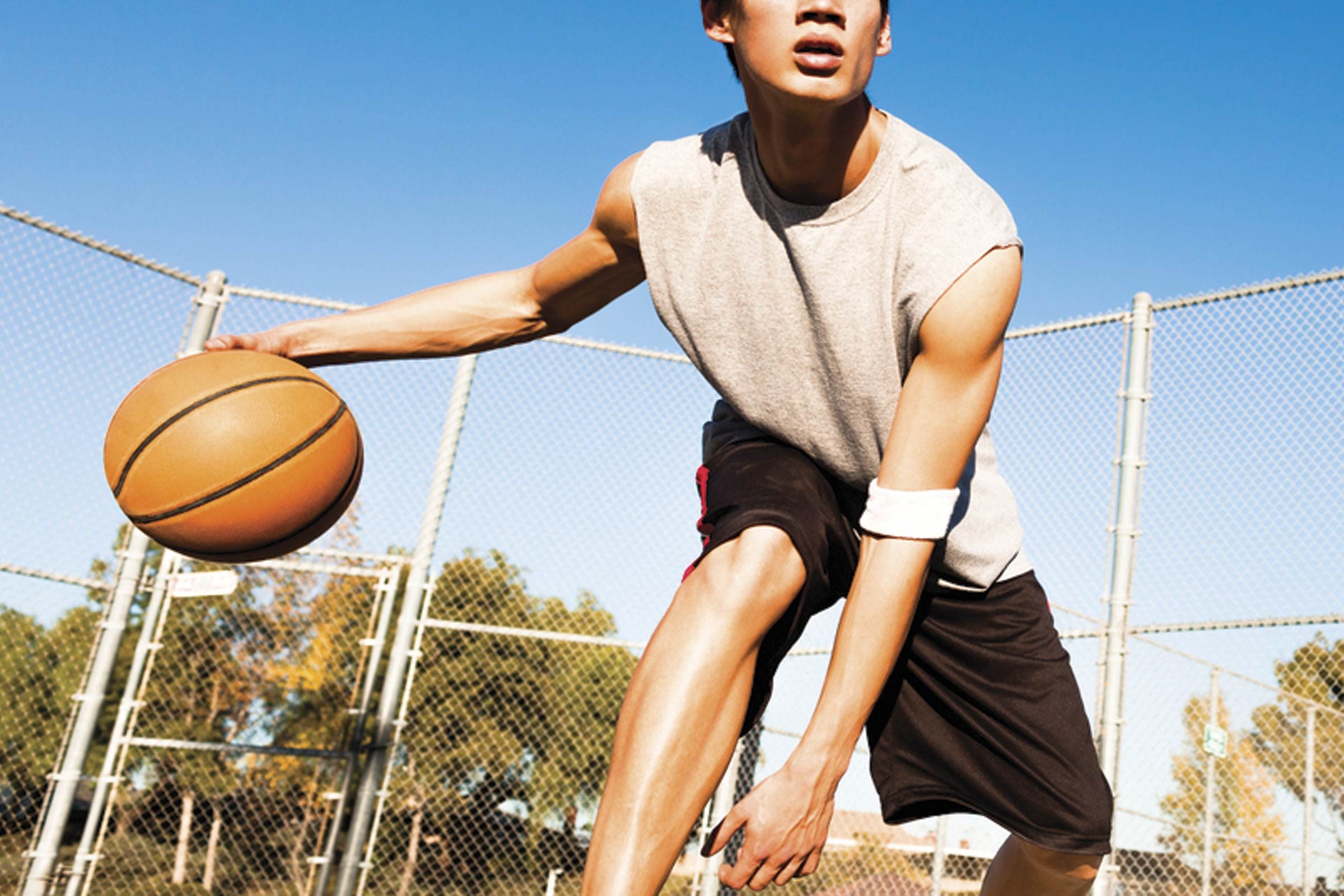 man playing basketball