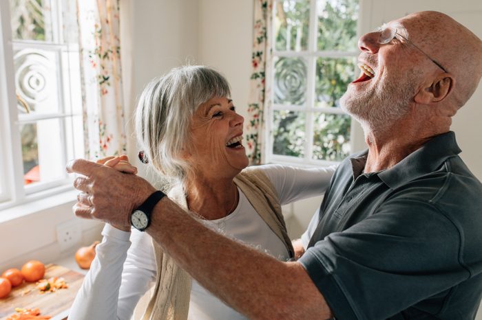 couple dancing at home