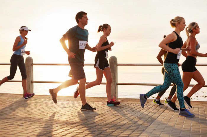 runners on boardwalk