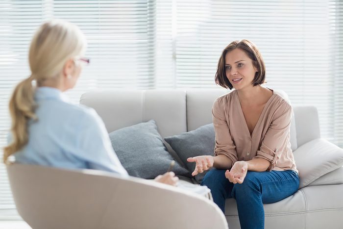 woman in counseling talking to therapist