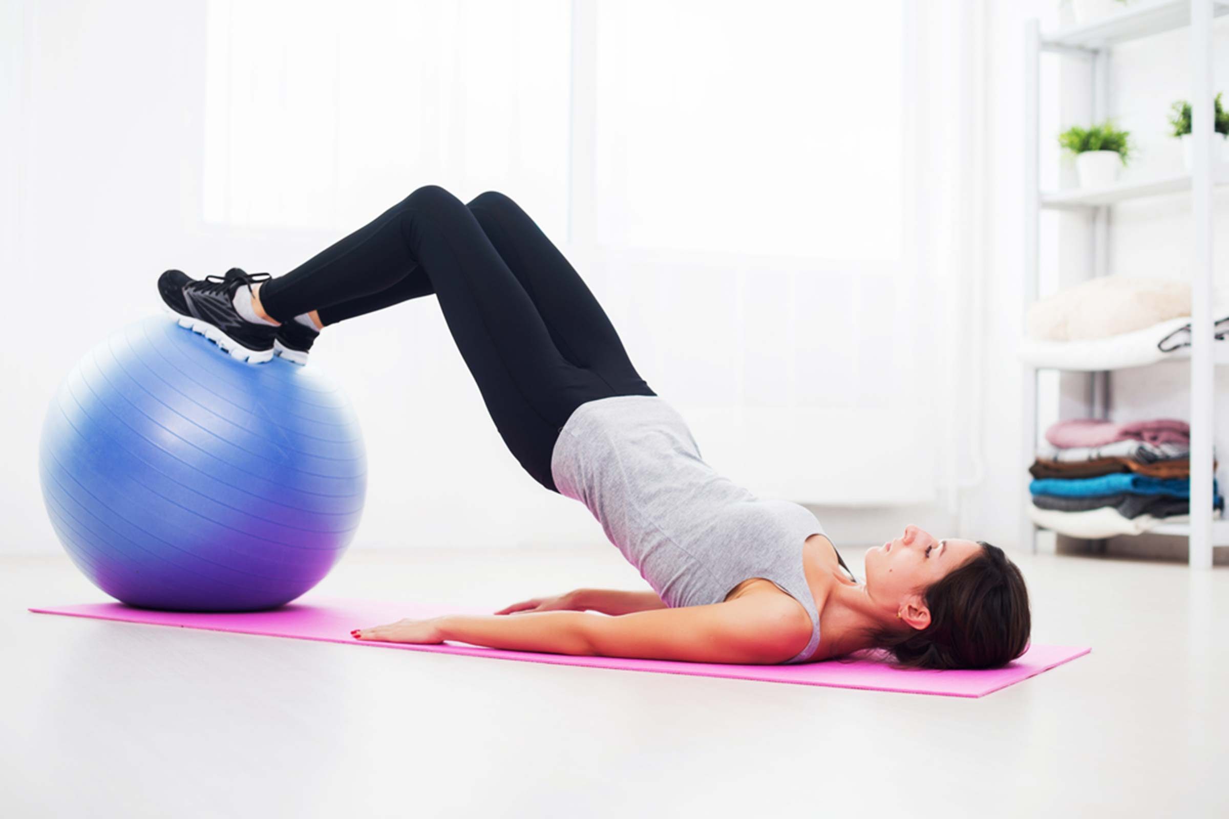 woman exercising on the floor