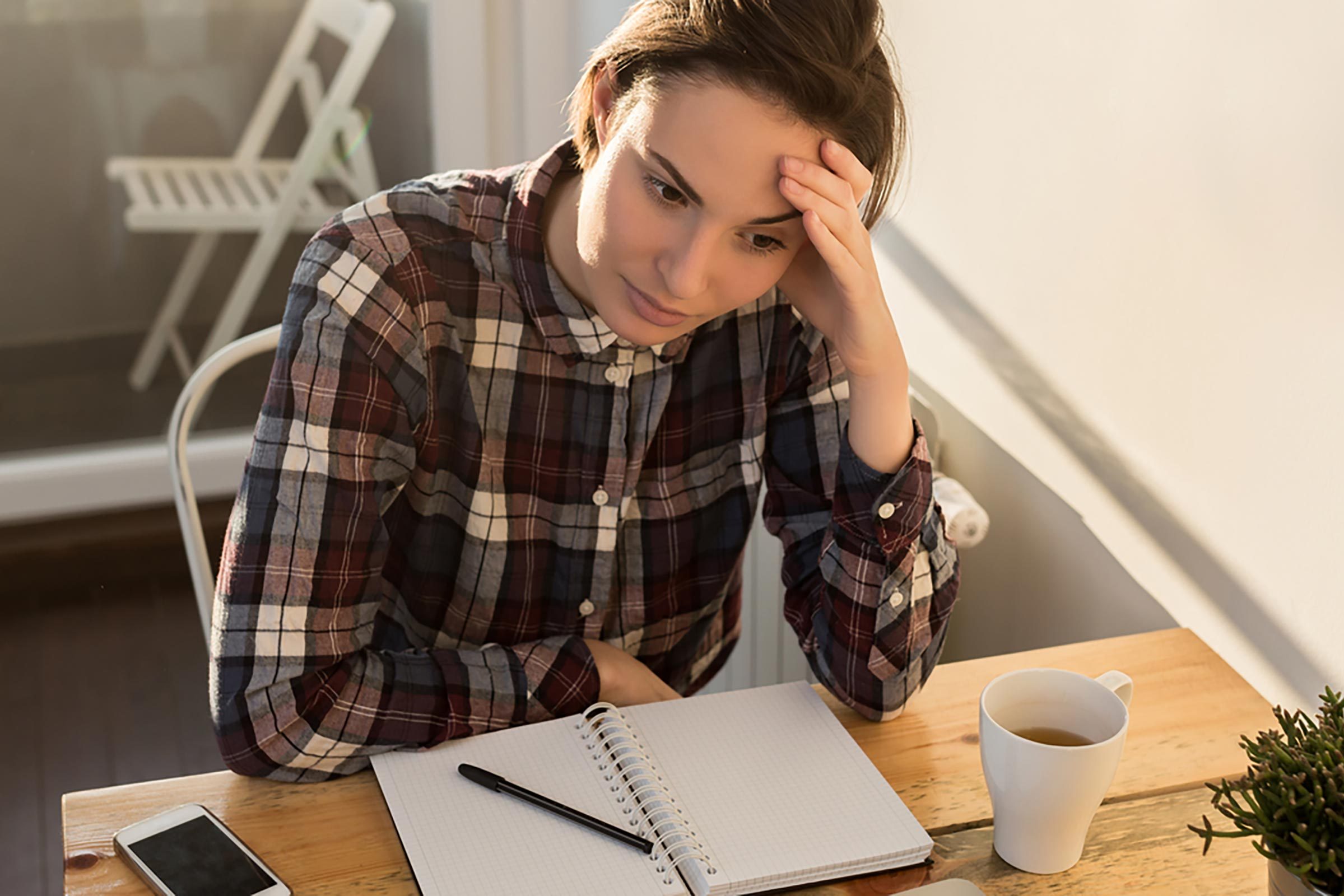 stressed woman at desk