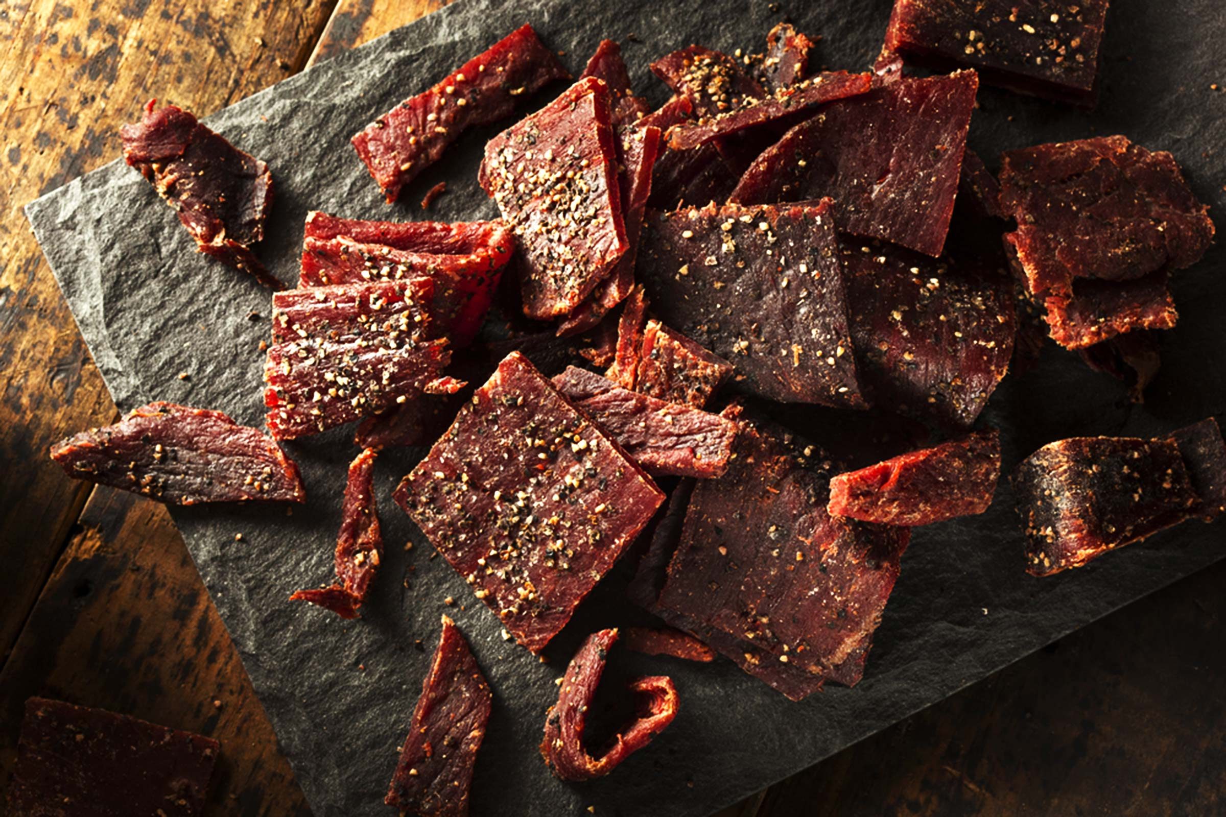 jerky on a granite cutting board