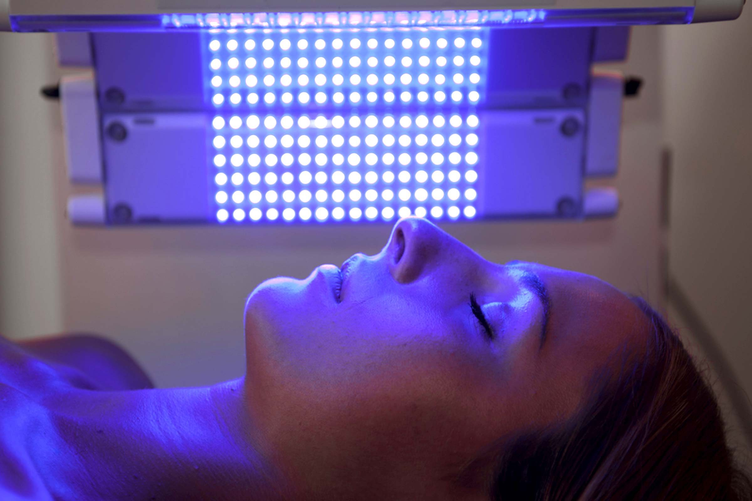 woman getting photodynamic therapy