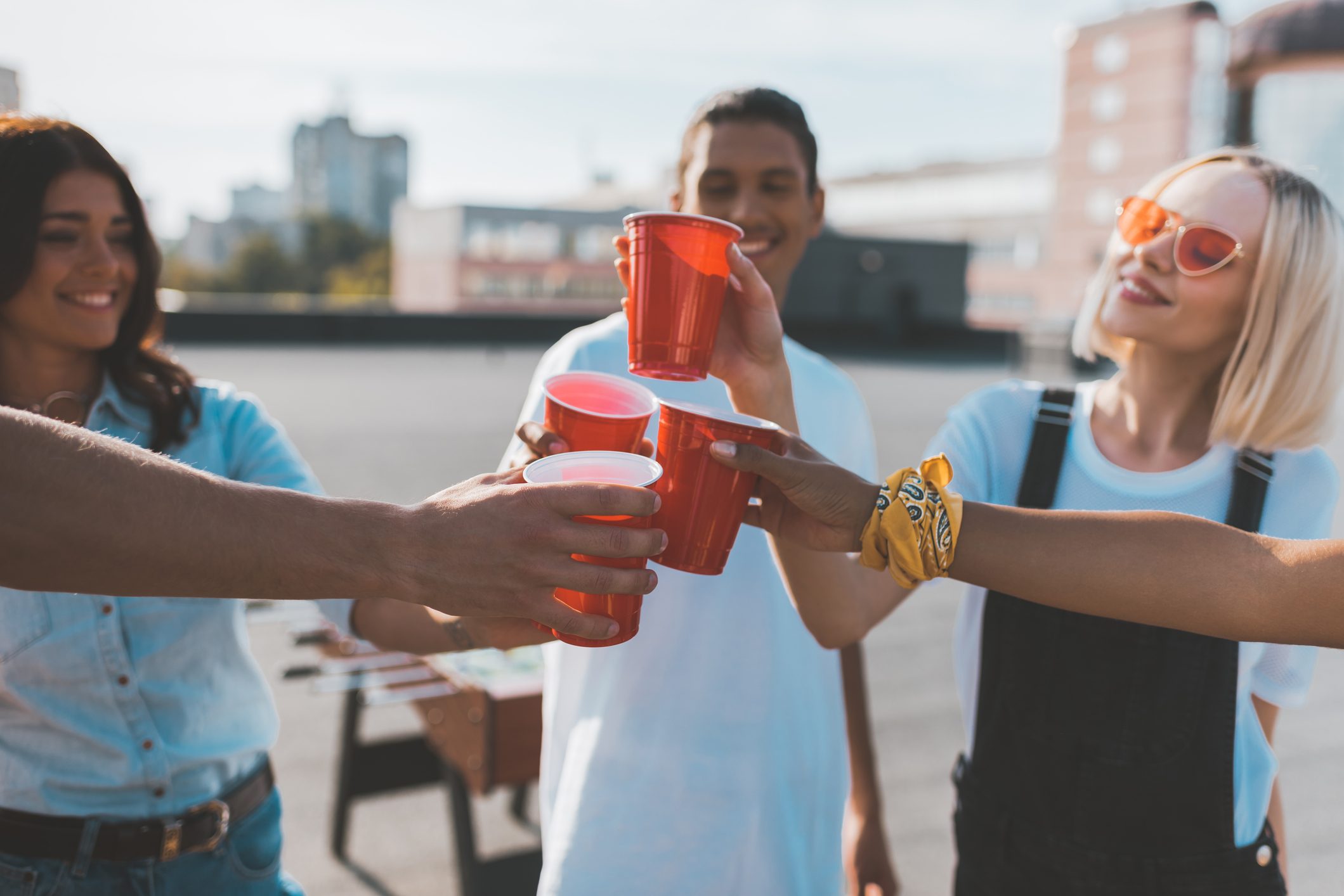 group of young friends drinking together