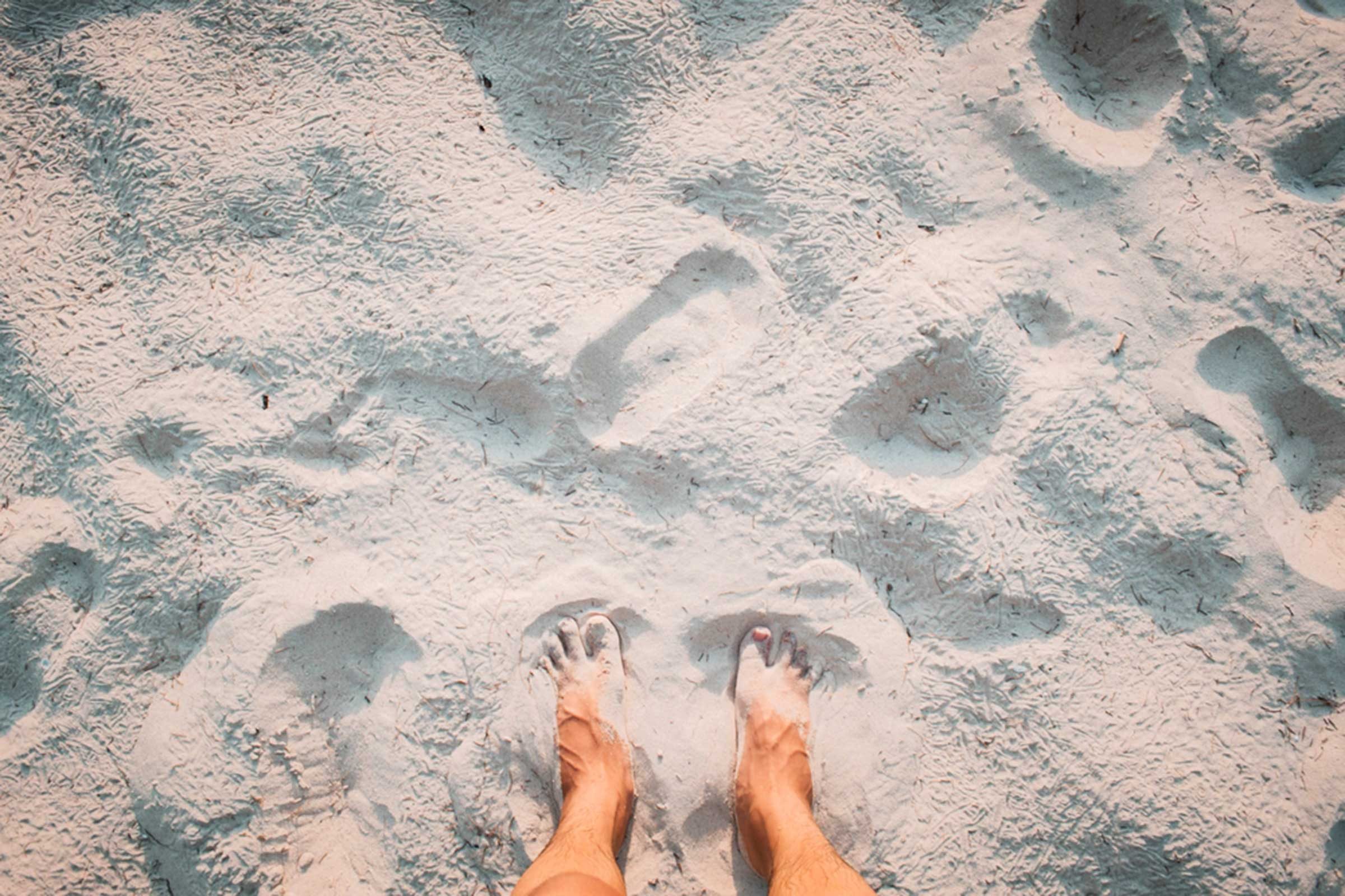 feet in the sand