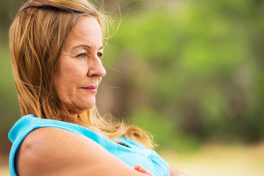 Contemplative older woman