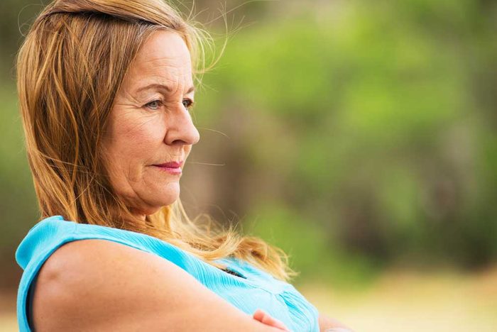 Contemplative older woman