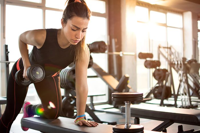 woman lifting weights