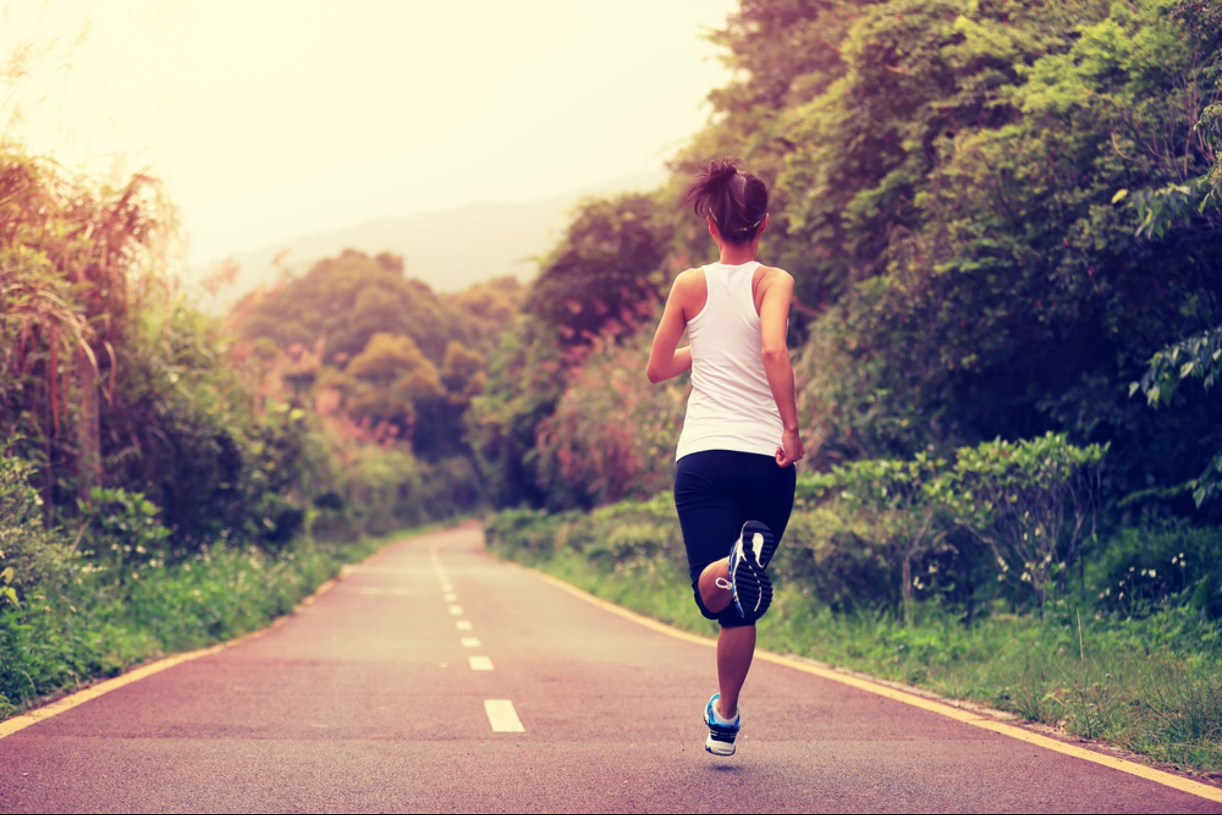 woman running on road
