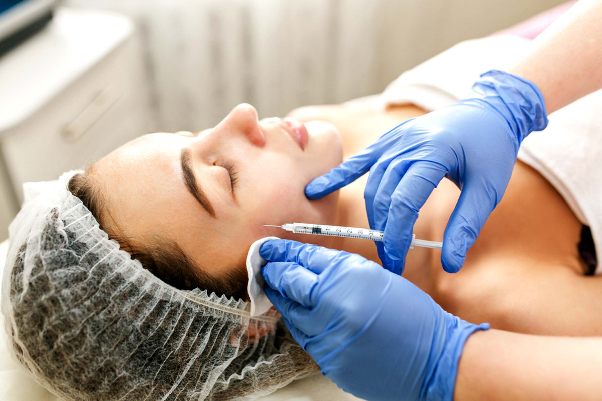 woman having facial injection