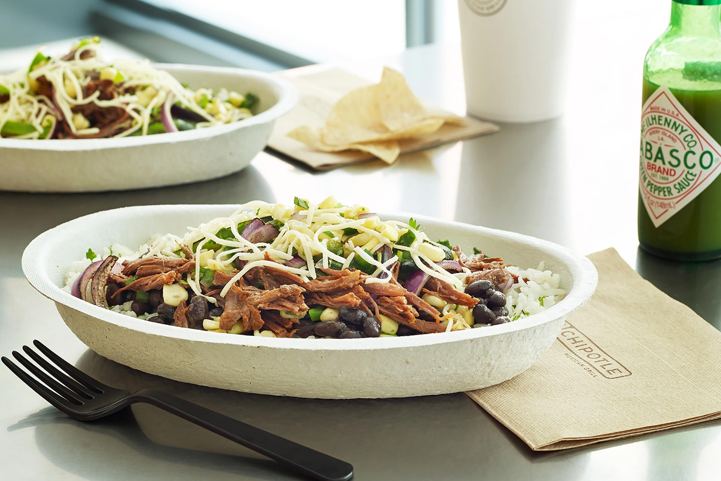 Chipotle burrito bowl on a table.